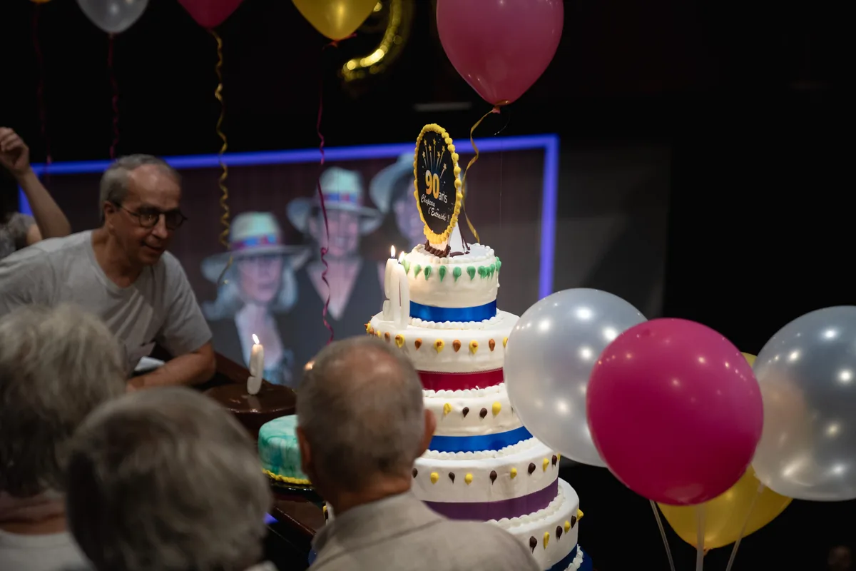 A birthday cake and balloons in the cinema
